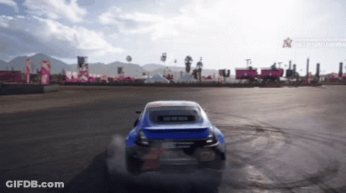 A Blue Car Is Driving Down A Road With Mountains In The Background And A Sign That Says " End Of Day Learning " GIF