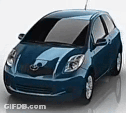 A Blue Car Is Sitting On A White Surface With A White Background . GIF