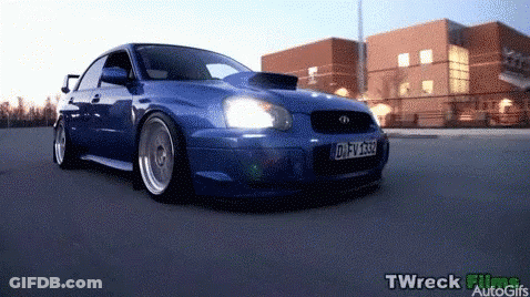 A Blue Car With A License Plate That Says D-Fv-1588 GIF