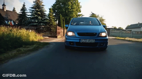A Blue Car With A License Plate That Says Ezd 4Sa5 GIF