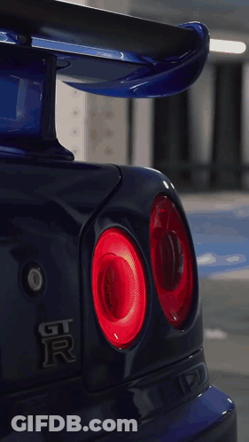 A Blue Car With A License Plate That Says Robo Hk9 GIF