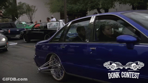A Blue Car With A Sticker That Says Donk Contest On It GIF