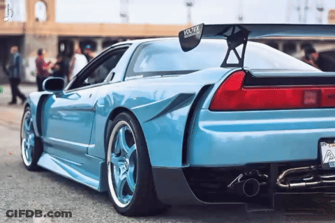 A Blue Car With A Voltex Sticker On The Back GIF
