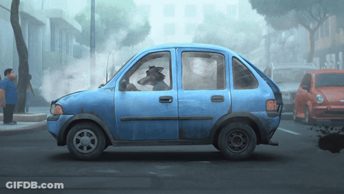A Blue Car With A Wolf In The Driver 'S Seat Is Driving Down A Street GIF