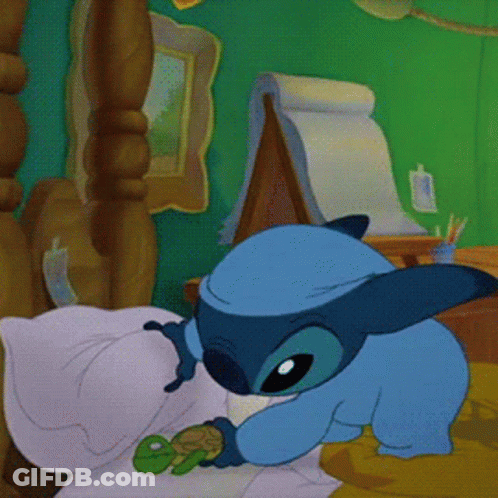 A Blue Cartoon Character Is Holding A Small Green Frog GIF