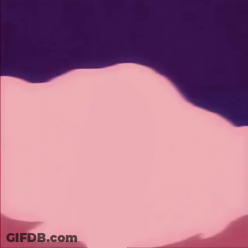 A Blue Cartoon Character Is Holding A White Object In His Hands GIF
