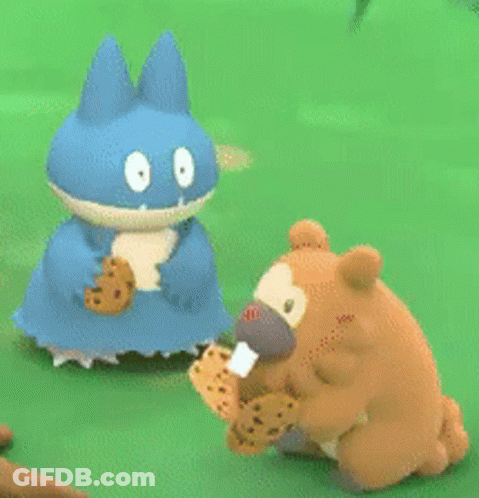 A Blue Cat And A Brown Bear Are Holding Cookies GIF
