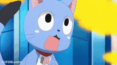 A Blue Cat With White Eyes And A Pink Heart On Its Chest GIF