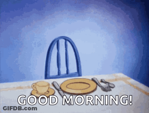 A Blue Chair Sits On A Table With Plates And Silverware And Says Good Morning GIF