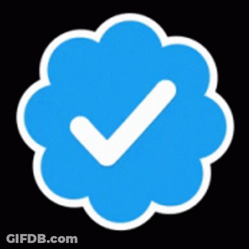 A Blue Check Mark In A White Cloud On A Black Background . GIF