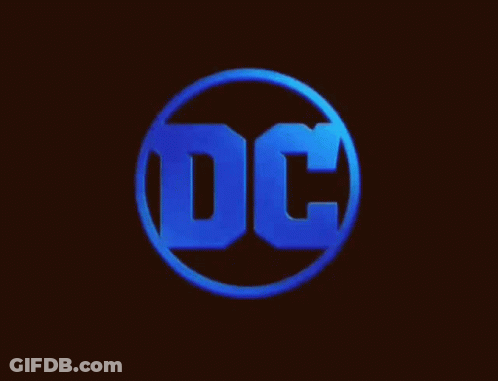 A Blue Dc Logo In A Circle On A Dark Background . GIF