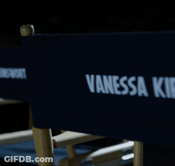A Blue Director 'S Chair With Vanessa Kirby Written On It GIF