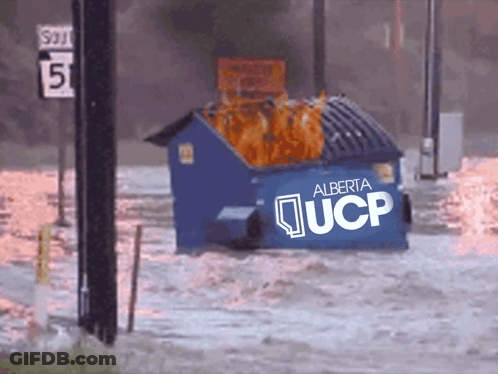 A Blue Dumpster With Alberta Ucp On It GIF