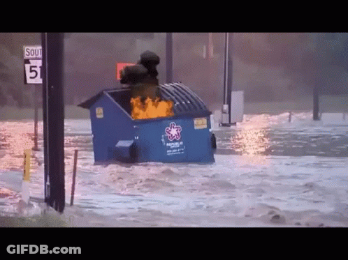 A Blue Dumpster With The Word Rescue On It Is Floating In The Water GIF