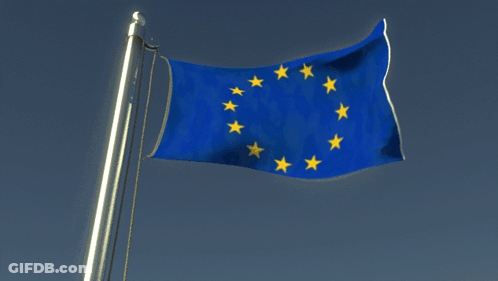A Blue Flag With Yellow Stars Is Flying In The Wind GIF