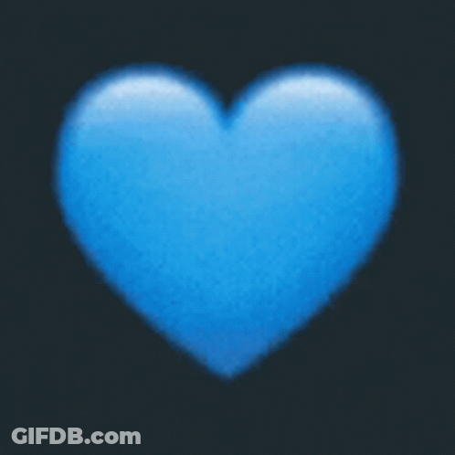 A Blue Heart On A Black Background Is A Blurred Image GIF