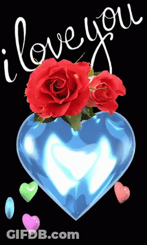 A Blue Heart With Red Roses In It And The Words " I Love You " GIF