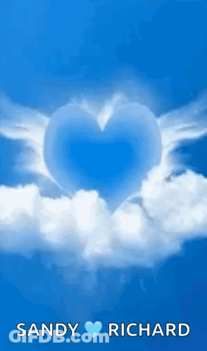 A Blue Heart With White Wings Is Surrounded By White Clouds In The Sky . GIF