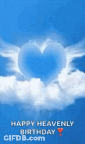 A Blue Heart With Wings Is Floating In The Sky . GIF