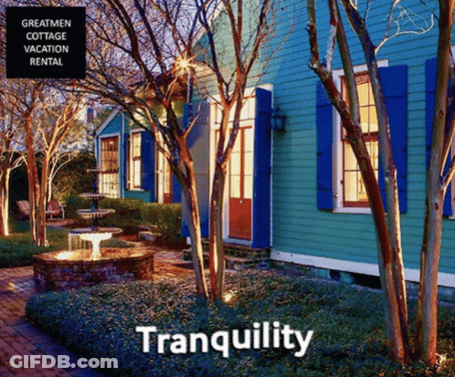 A Blue House With Blue Shutters Is Advertised As A Tranquility Vacation Rental GIF