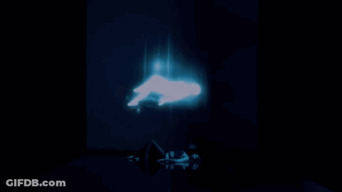 A Blue Light Is Coming Out Of A Dark Room GIF