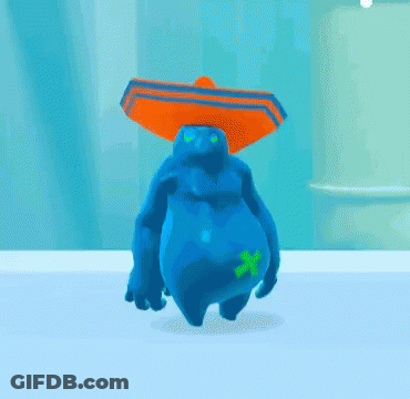 A Blue Monster Wearing An Orange Sombrero With A Green Leaf On Its Back GIF