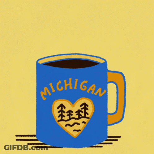 A Blue Mug That Says Michigan With A Heart And Trees On It GIF