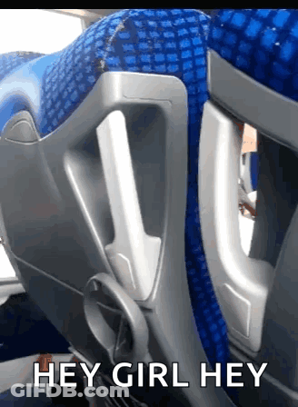 A Blue Seat On A Bus With The Words Hey Girl Hey GIF