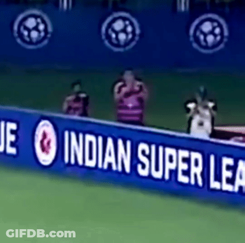 A Blue Sign That Says Indian Super League Is On A Soccer Field GIF