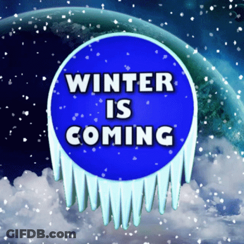 A Blue Sign That Says Winter Is Coming With Icicles On It GIF