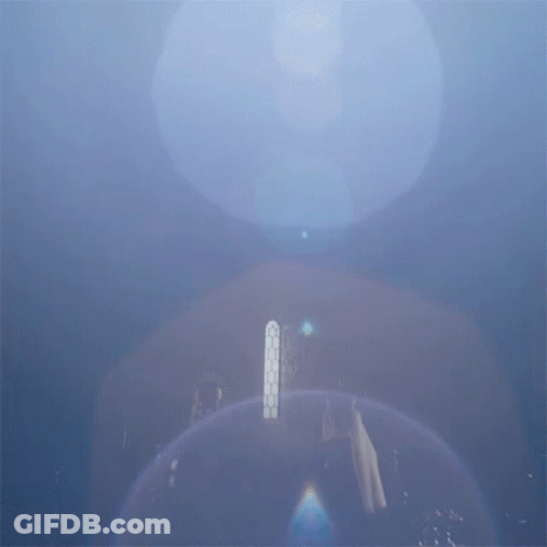 A Blue Sky With A Few Clouds And A Few Lights GIF