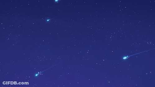 A Blue Sky With A Few Shooting Stars In It GIF