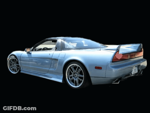 A Blue Sports Car With A License Plate That Says Jrb GIF