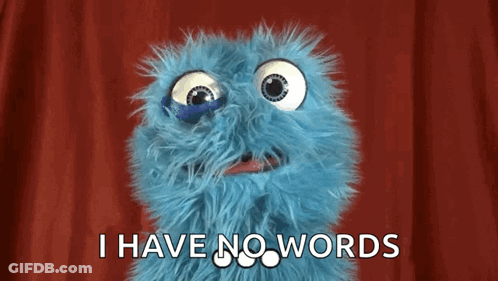 A Blue Stuffed Animal With Big Eyes Is Saying I Have No Words . GIF