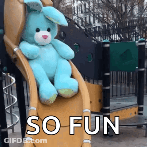 A Blue Stuffed Bunny Sits On A Slide With The Words So Fun Below It GIF