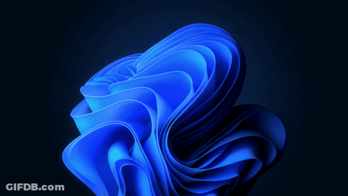 A Blue Swirl Against A Black Background That Looks Like A Rose GIF