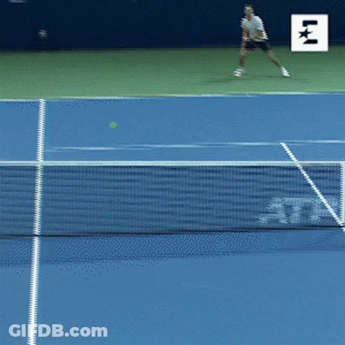 A Blue Tennis Court With A Sign That Says Western & Southern On It GIF