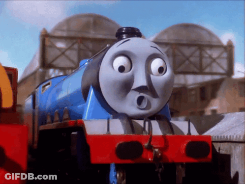 A Blue Train With A Surprised Face On It GIF