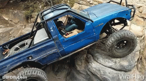 A Blue Truck With The Word 4Wd On The Front GIF