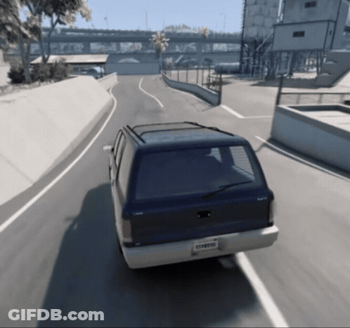 A Blue Van With A License Plate That Says Lvvpdd Drives Down A Road GIF