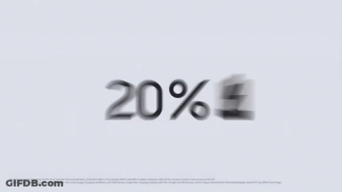 A Blurred Image Of A 20 % Discount Sign On A White Background . GIF