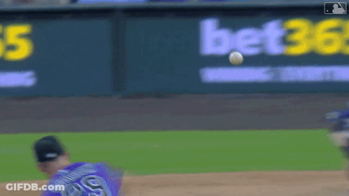 A Blurred Image Of A Baseball Field With A Bet365 Sign In The Background GIF