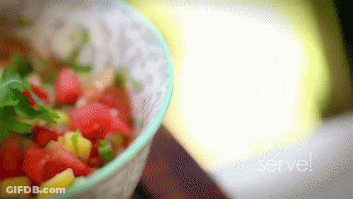 A Blurred Image Of A Bowl Of Food With The Words Serve Written On The Bottom GIF