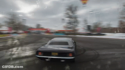 A Blurred Image Of A Car Driving Down A Road GIF