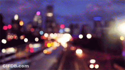 A Blurred Image Of A City At Night GIF