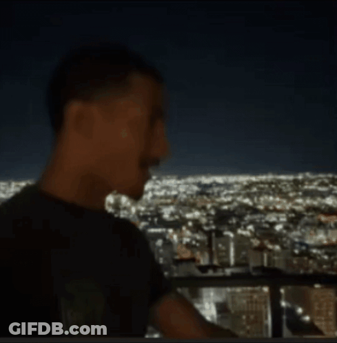 A Blurred Image Of A City At Night GIF