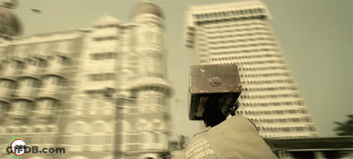 A Blurred Image Of A City With The Word Zee On The Bottom Right GIF