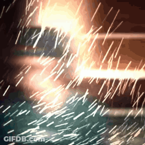 A Blurred Image Of A Fireworks Display With A Google Logo In The Lower Right Corner GIF