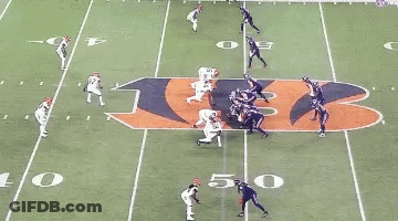 A Blurred Image Of A Football Game With A Player Wearing The Number 55 GIF