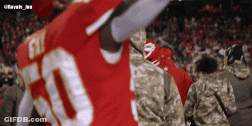 A Blurred Image Of A Football Player With The Number 50 On His Jersey GIF